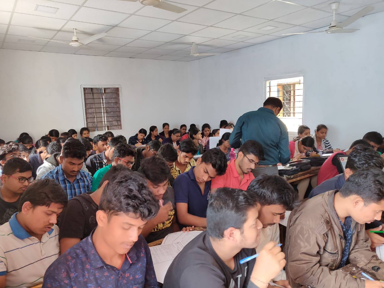 Large batch of SS Career Care students during an examination session